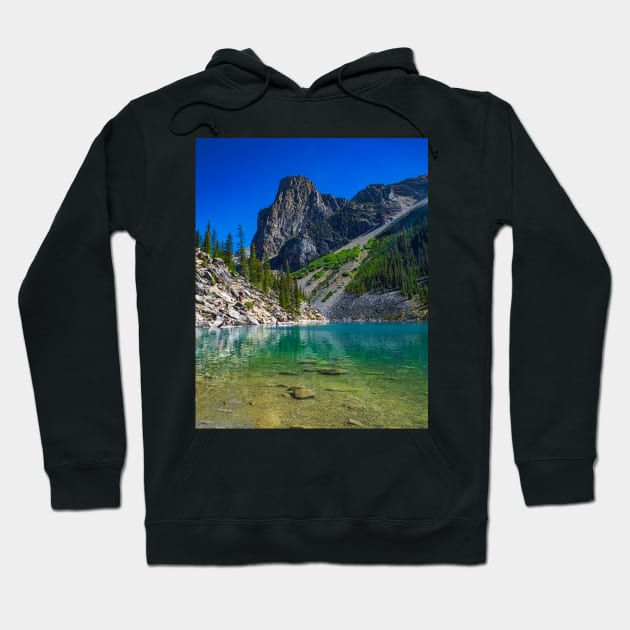 By the Rockpiles at Moraine Lake Hoodie by BrianPShaw